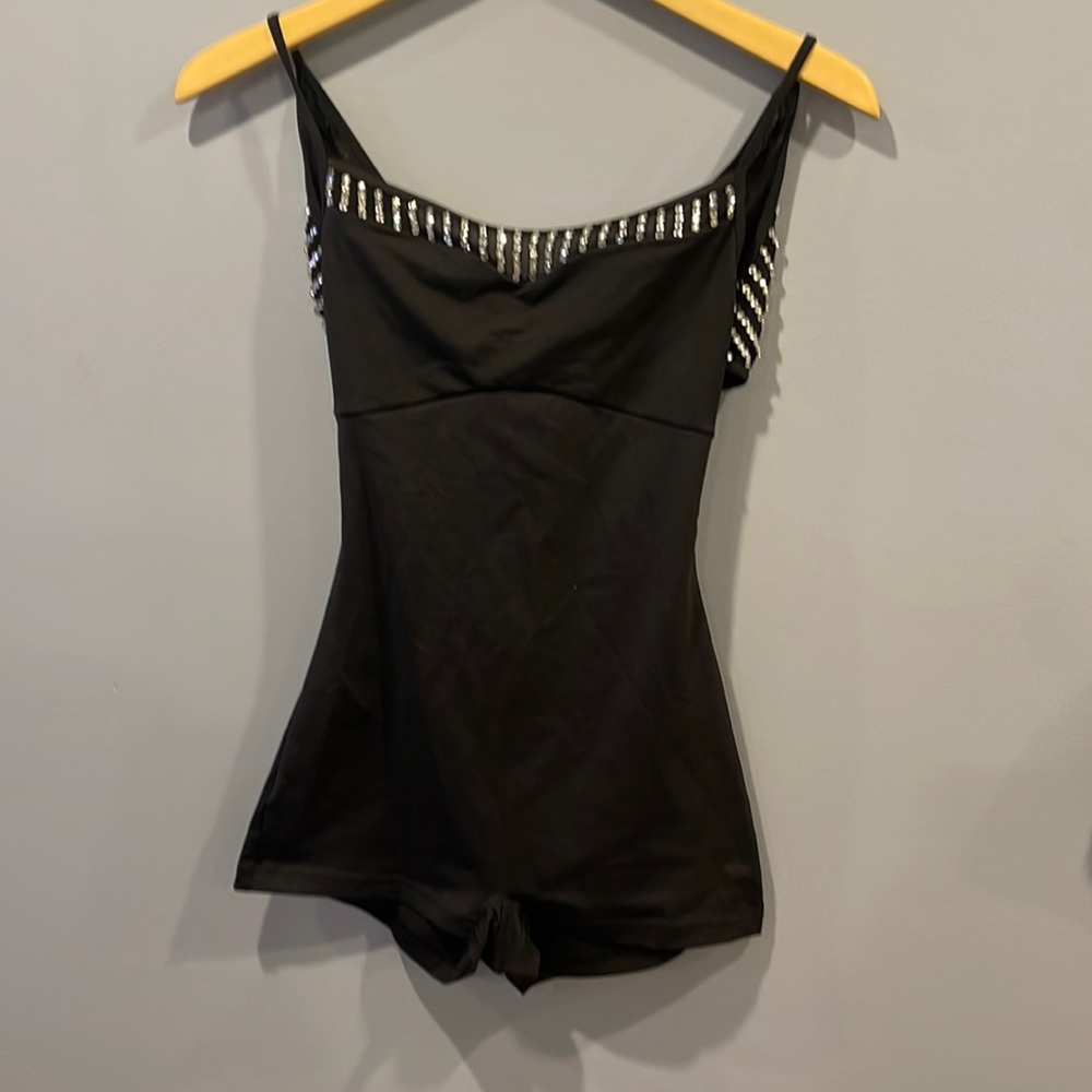Black leotard with crystals. *there are a few missing will need to be repaired**